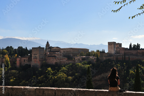Obraz na płótnie Alhambra palace, snow covered peaks of the Sierra Nevada in bright sunlight during Covid-19-autumn 2020 w salonie