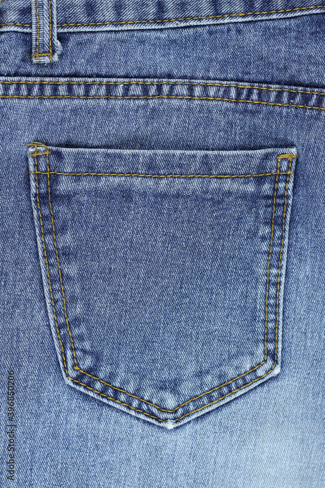 Close up of a pocket of blue jeans. Close up of a pocket of blue jeans.