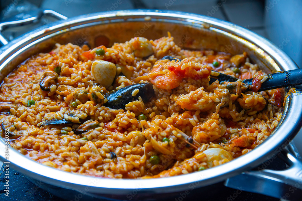 Paella preparation. Mediterranean seafood dish Paella preparation. Mediterranean seafood dish