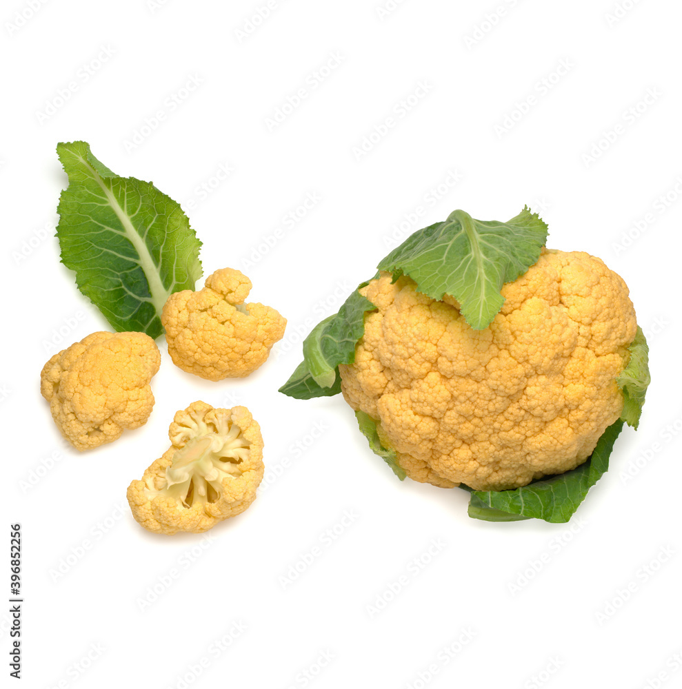 Yellow cauliflower path and its pieces isolated on a white, top view Yellow cauliflower path and its pieces isolated on a white, top view