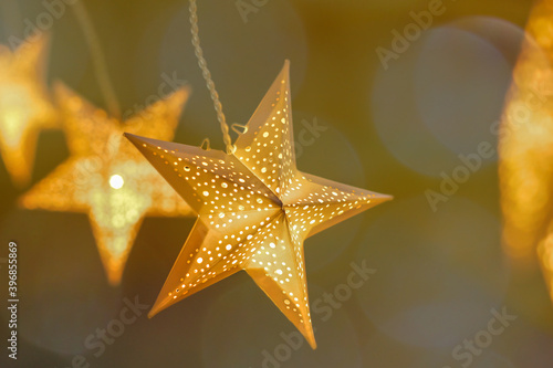 decorations for the holiday. white paper stars.background for Christmas and new year holidays.