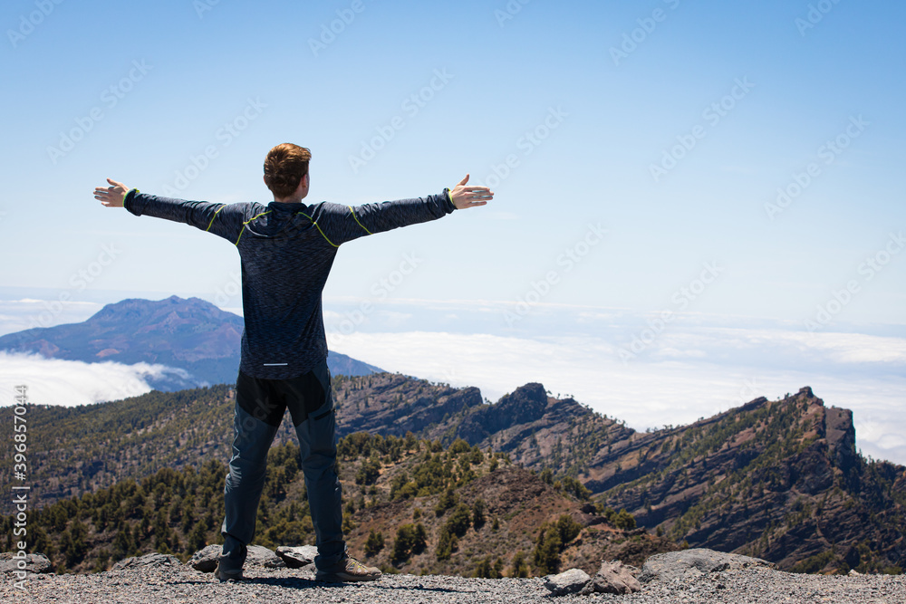 happy man above the clouds travelling on Canary Island La Palma happy man above the clouds travelling on Canary Island La Palma