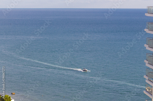 Open water space with motorboat, Sochi, Russia.