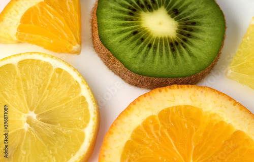 Fruit slices: lemon, orange, kiwi