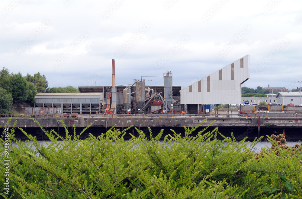 Riverside Industrial Buildings and Bushes 