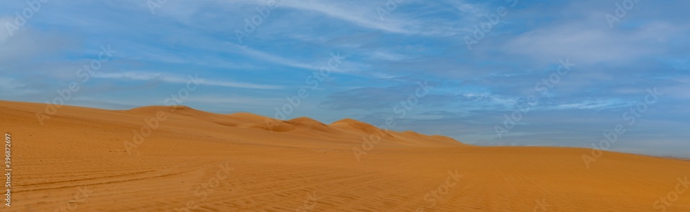 Middle East orange sand dunes desert panorama Middle East orange sand dunes desert panorama