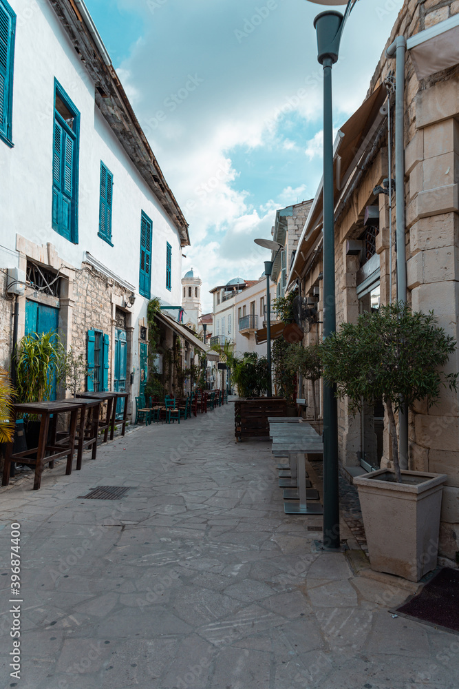 Ancient streets of the Cyprus city of Limassol, colonial architecture and intertwining of different civilizations Ancient streets of the Cyprus city of Limassol, colonial architecture and intertwining of different civilizations