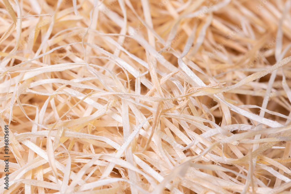 wood shavings background . Concept of environmentally friendly packaging of fragile items.