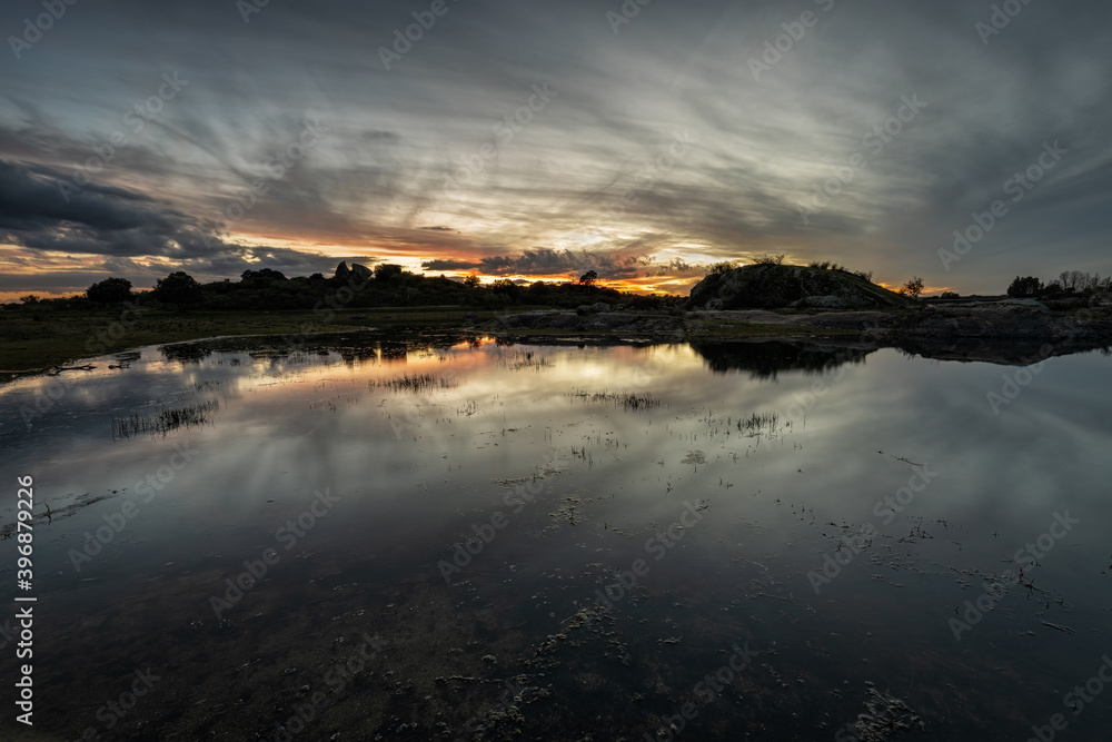 Sunset in the natural area of the Barruecos. Extremadura. Spain. Sunset in the natural area of the Barruecos. Extremadura. Spain.