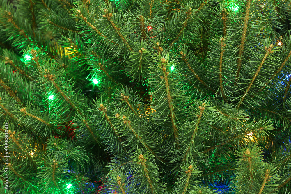 Glowing bright fairy lights on Christmas tree Glowing bright fairy lights on Christmas tree
