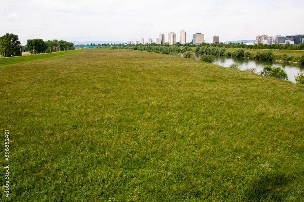 Panorma of Sava river bank with cityscape in the distance in Zagreb, Croatia Panorma of Sava river bank with cityscape in the distance in Zagreb, Croatia