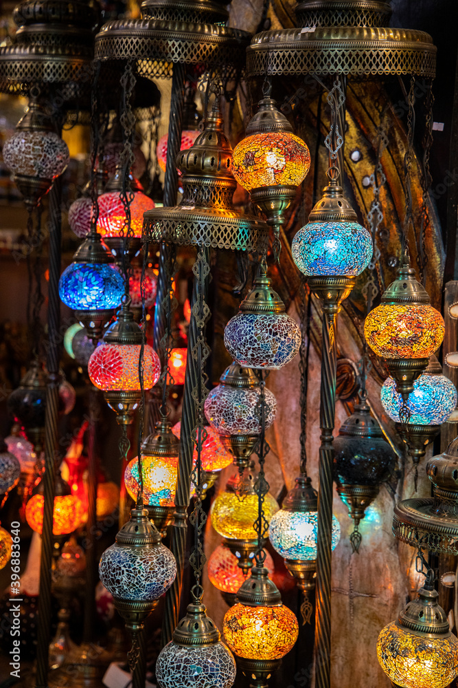 Colorful handmade hanging glass ornamental lamps made of glass material and copper metal for decorative and decoration sold in the gift shop