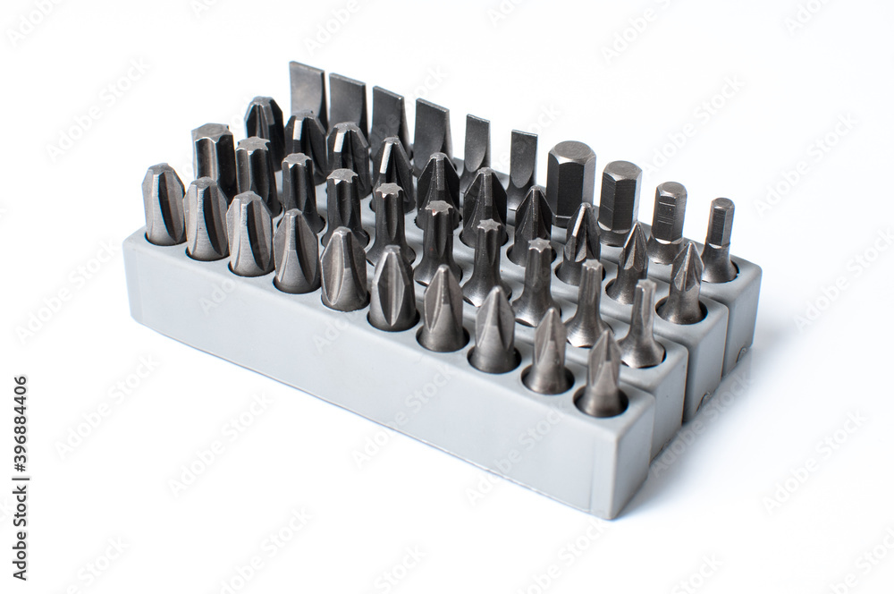 Fototapeta premium Set of heads for screwdriver in grey box isolated on white background