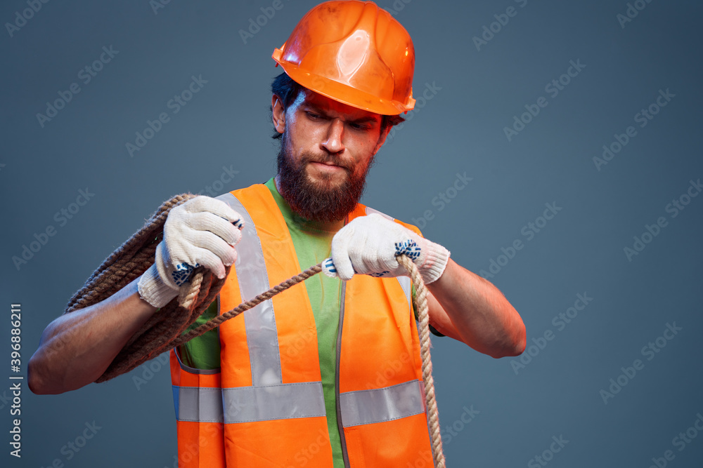 A man in a working uniform construction security professionals A man in a working uniform construction security professionals