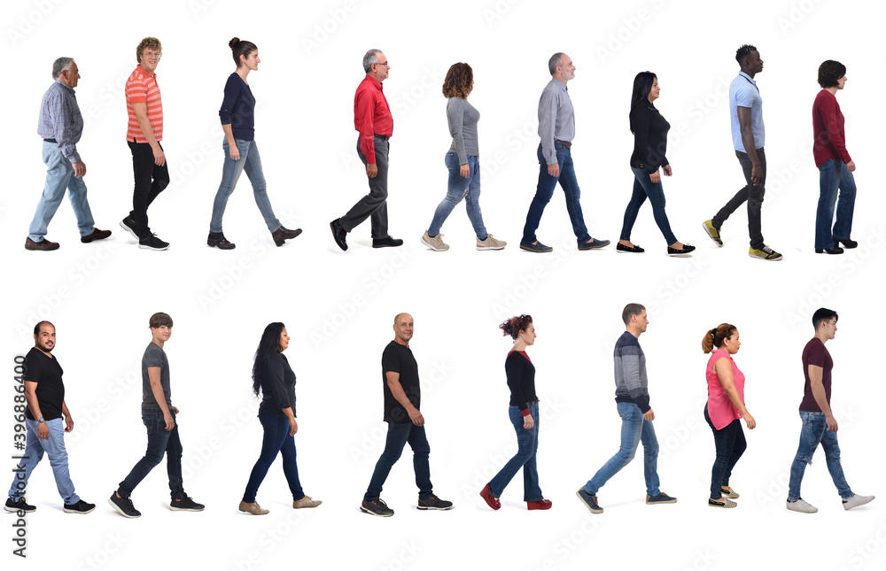 Obraz premium large group of people wearing blue jeans walking on white background