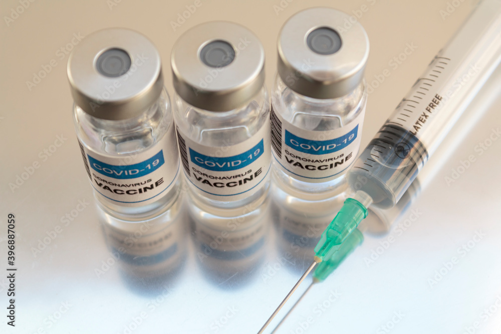 Laboratory Injection Vials with Covid-19 coronavirus vaccine and syringe Laboratory Injection Vials with Covid-19 coronavirus vaccine and syringe