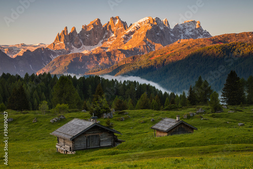 View on the Pale di San Martino group from the Fuciade huts at sunrise, Dolomites, Trentino Alto Adige, Italy photo