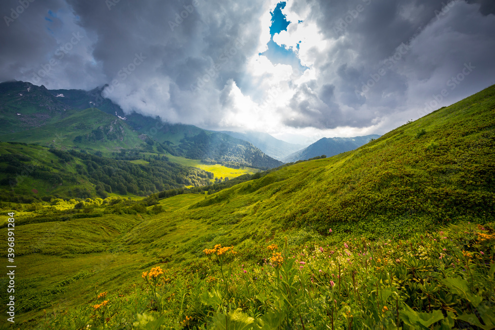 Obraz premium Beautiful mountain landscape with clouds at Caucasus mountains