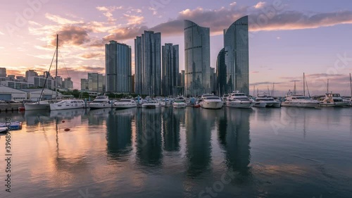 Wallpaper Mural Time Lapse Sunrise of Busan Marina city skyscrapers with reflection in water, South Korea.Zoom in Torontodigital.ca