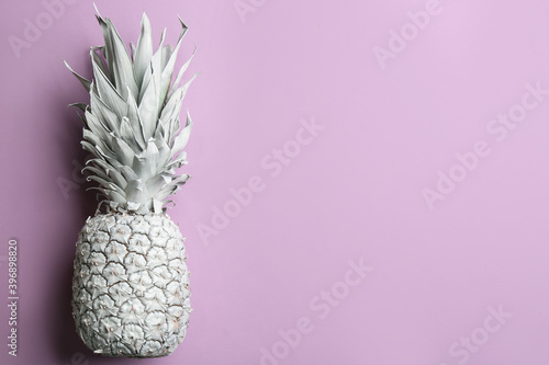 White pineapple on light background, top view with space for text. Creative concept