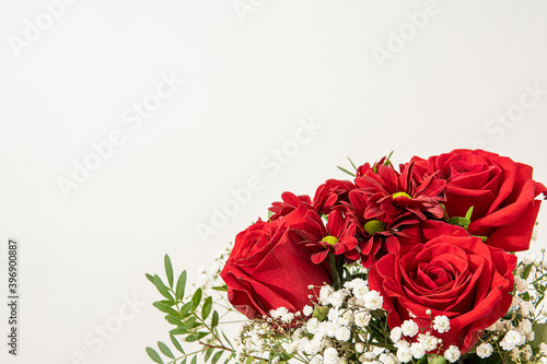 bouquet of flowers. red roses and red daisies
