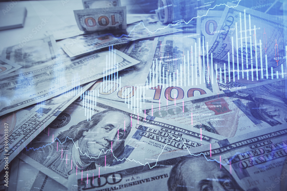 Multi exposure of forex chart drawing over us dollars bill background. Concept of financial success markets. Multi exposure of forex chart drawing over us dollars bill background. Concept of financial success markets.