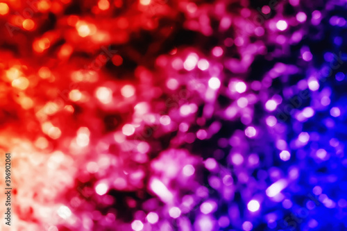 colorful red,blue ,violet and purple light bokeh abstract festival design background