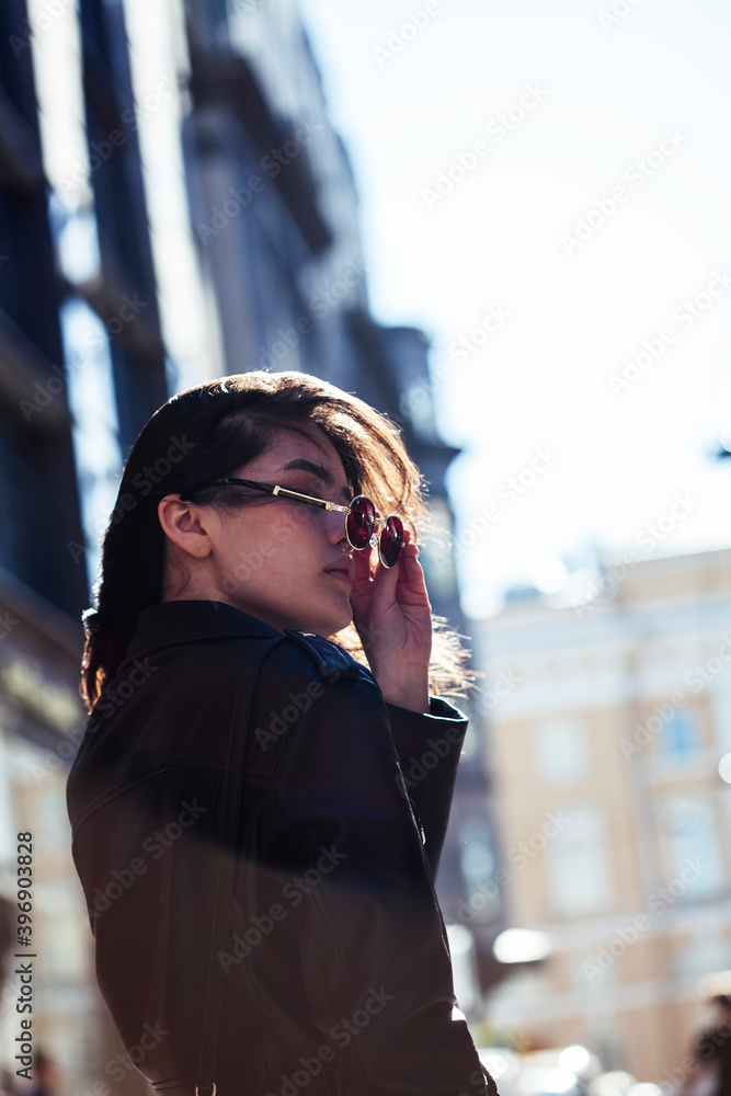 Fototapeta premium young pretty asian girl outside on big city street, lifestyle people concept