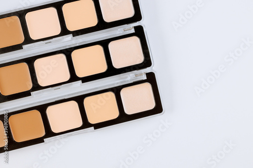 Style beautiful colors of makeup eyeshadow palette on isolated white background