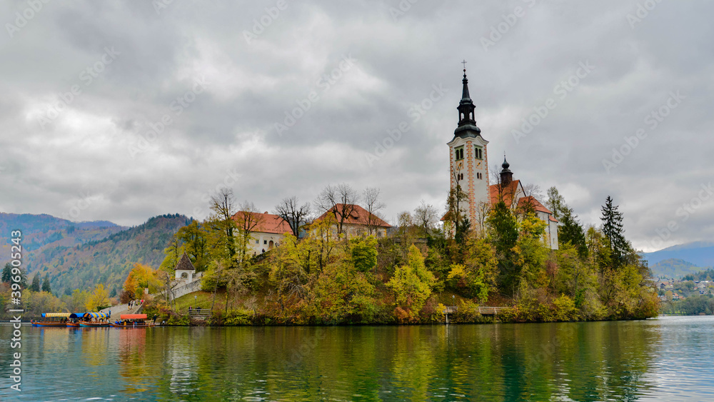 a church on the island on Lake Bled, Slovenia in autumn