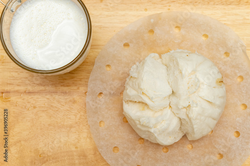 traditional Chinese bun with cup of milk photo