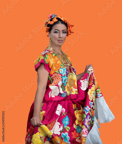 Obraz na płótnie mexican latin woman with traditional folk costume with multicolored background,