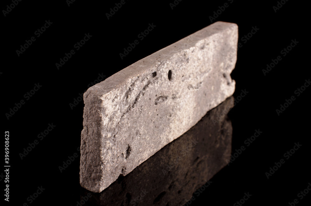 Clinker brick isolated on the black Clinker brick isolated on the black