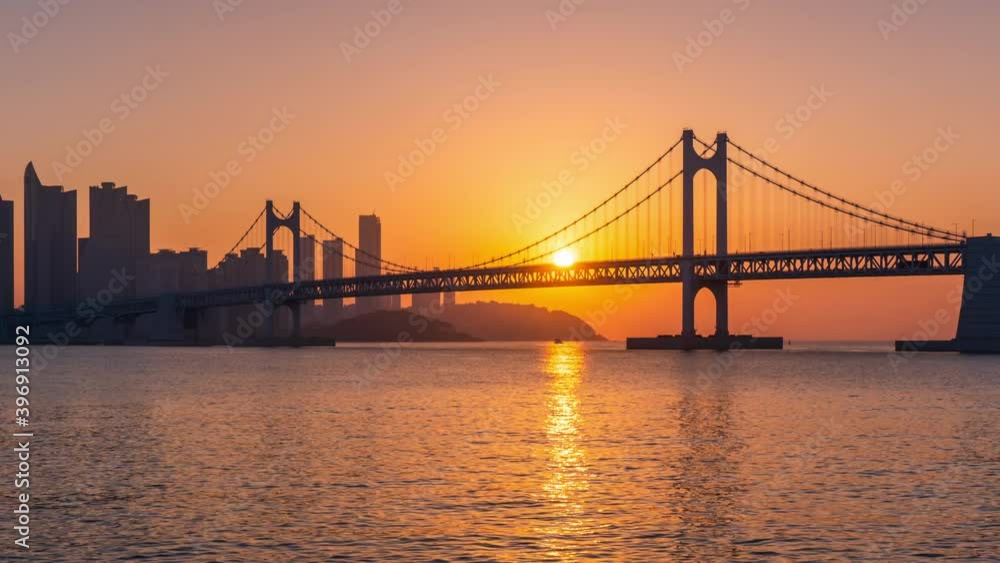 Sunrise of Gwangan Bridge and Haeundae at Busan City, South Korea.Zoom out Sunrise of Gwangan Bridge and Haeundae at Busan City, South Korea.Zoom out