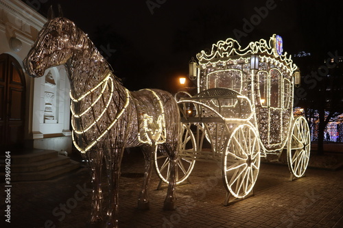 magic carriage with illumination at winter street