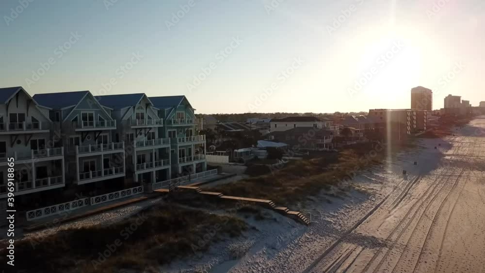 Row Of 4 Story Beachfront Vacation House On A Sunny Morning In Panama City Beach, Florida, USA. - aerial Row Of 4 Story Beachfront Vacation House On A Sunny Morning In Panama City Beach, Florida, USA. - aerial