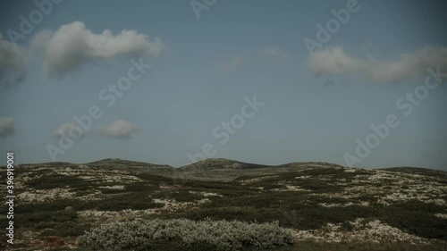 Beautiful summer clouds growing and disappearing in mountain area. Time lapse video photo