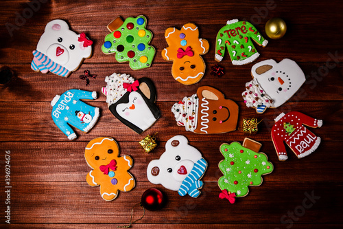 Gingerbread cookies of gingerbread man, christmas tree, polar bear, christmas sweater (reads 