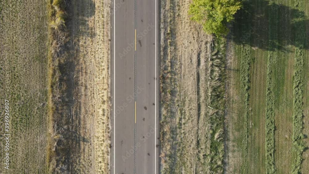 Following a road while panning up using drone Following a road while panning up using drone