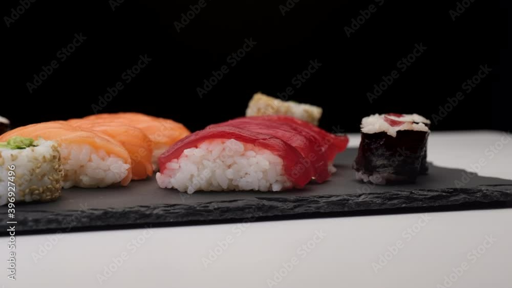 Sushi assortment rotating on a plate Sushi assortment rotating on a plate