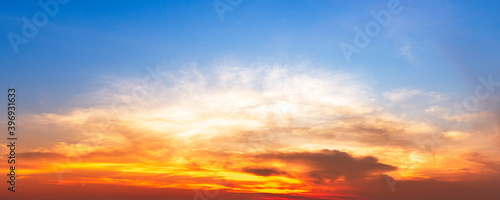 Dramatic orange cloud sky nature panorama background © c_atta
