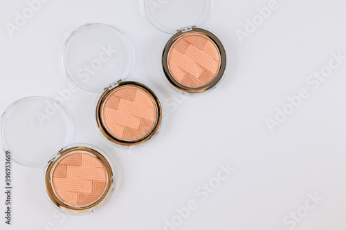 Make up flat lay multicolored eye shadow in the drawing eye lines on isolated white background