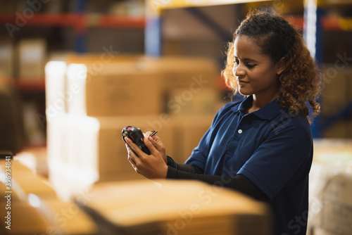 warehouse worker using bar ...