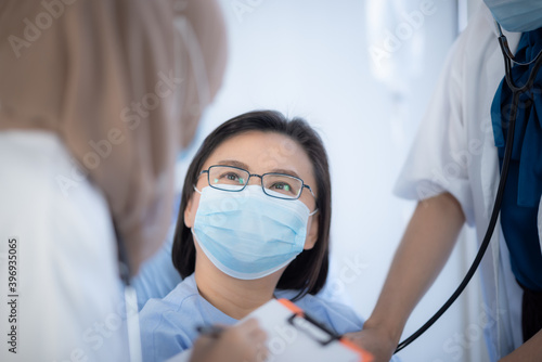 senior woman patient and young woman doctor, friendly doctor encouragement, empathy and support following a medical examination. Trust and medical ethics concept