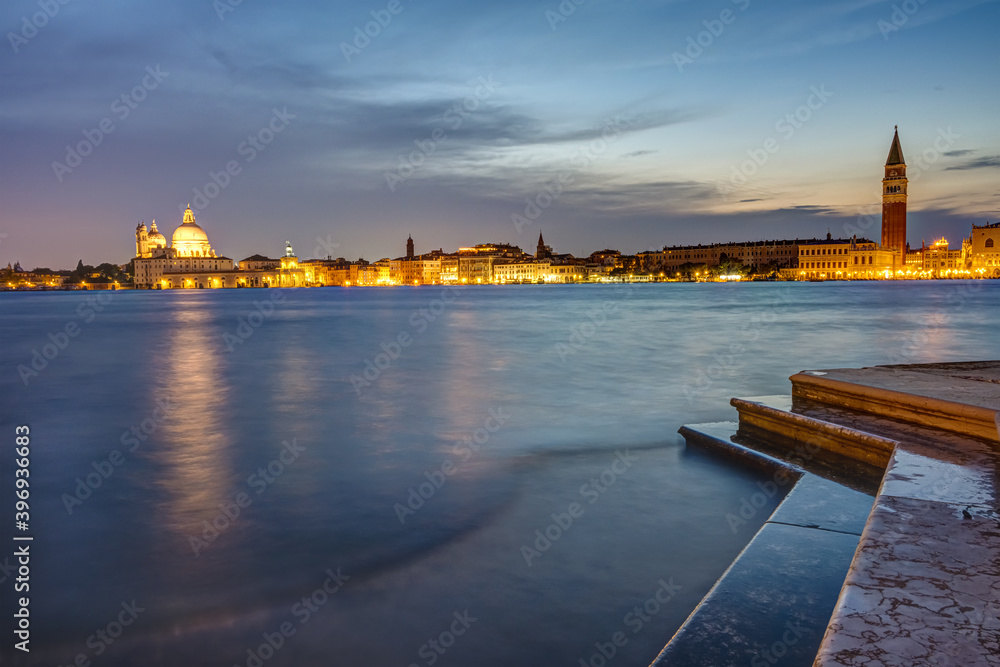 View to St Marks square and Punta della Dogana in Venice at night