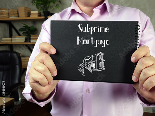 Financial concept about Subprime Mortgage with sign on the piece of paper. photo