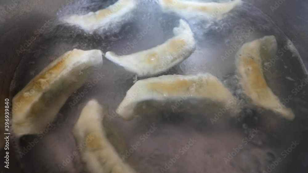Potstickers Cooking in Boiling Water Potstickers Cooking in Boiling Water