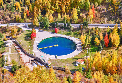 Reservoir for water purification in the mountains in the autumn season