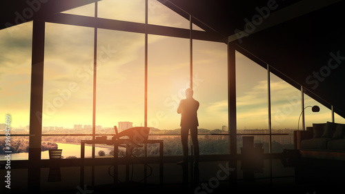 A businessman in his office looks at the cityscape at sunrise.