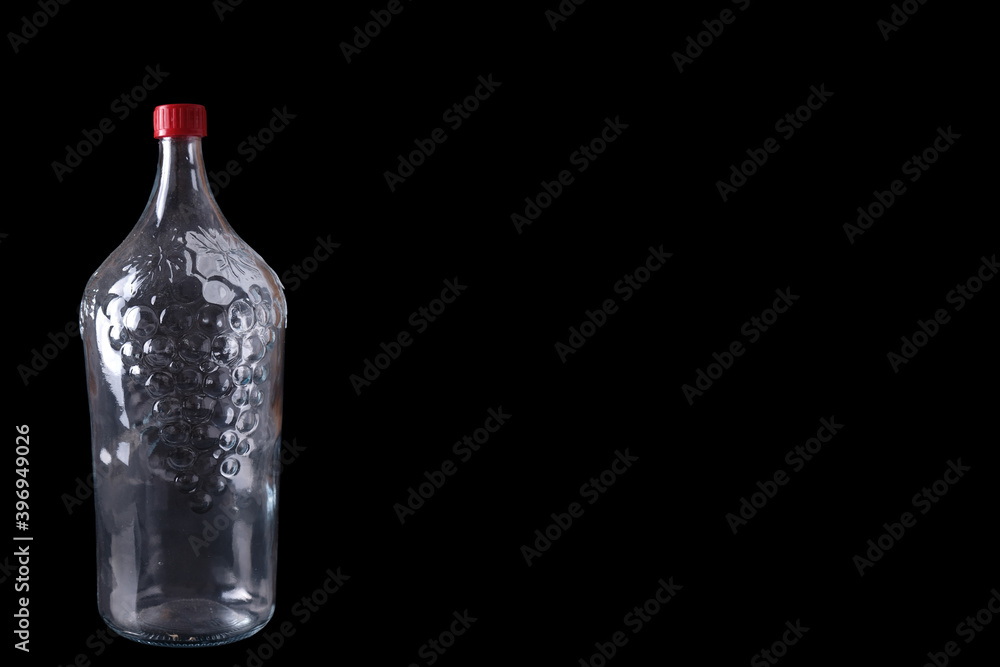 Wine bottle isolated on black. Empty whine bottle on a black. Space for text Wine bottle isolated on black. Empty whine bottle on a black. Space for text